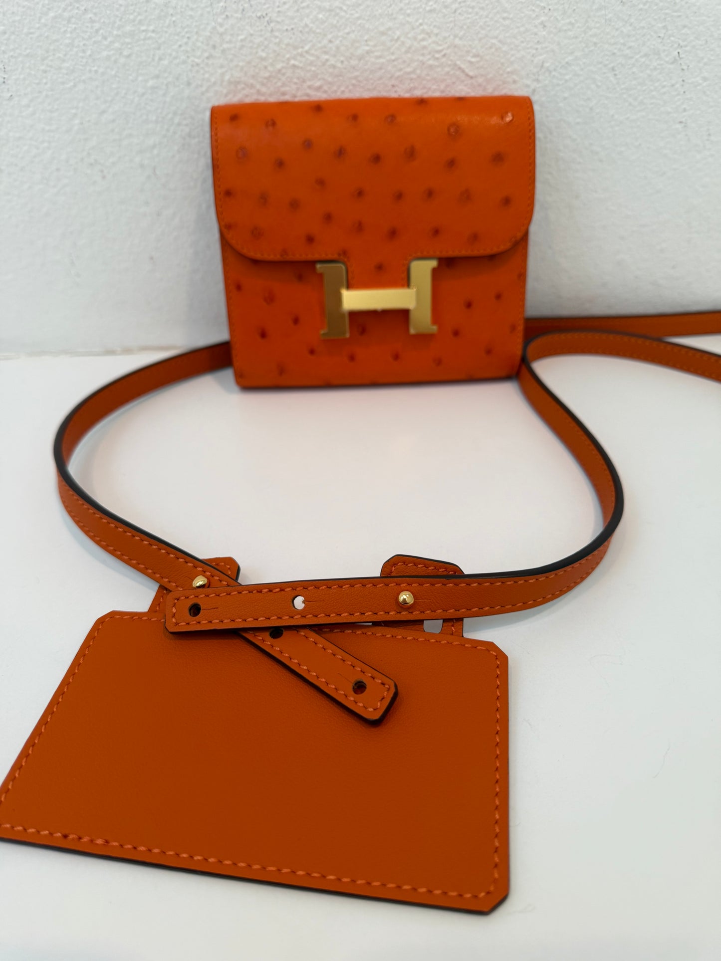 NEW RARE HERMES Constance Short Wallet Clutch in Orange Ostrich with Palladium HW& Leather Strap
