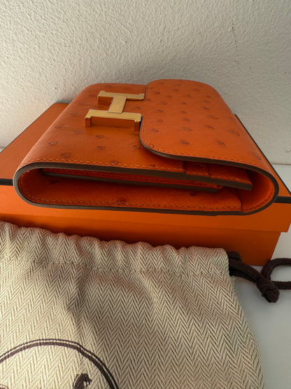 NEW RARE HERMES Constance Short Wallet Clutch in Orange Ostrich with Palladium HW& Leather Strap