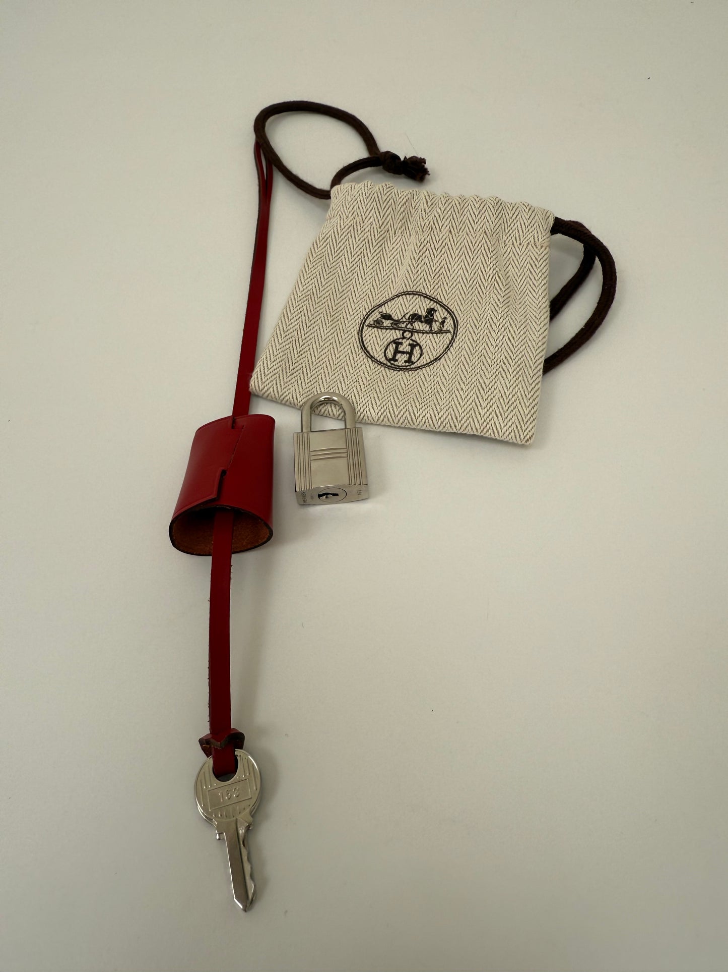 NEW HERMES Red Leather Clochette for Kelly or Birkin, Lock & 2 Keys Set with dust bag