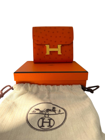 NEW RARE HERMES Constance Short Wallet Clutch in Orange Ostrich with Palladium HW& Leather Strap